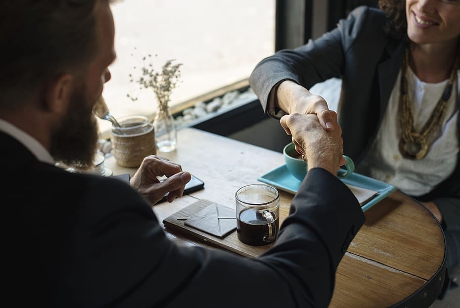 Man, women hand, shake, adults, beverage, brainstorming, break, coffee ... Understanding Consumer Purchase Behavior in the Travel and Tourism Industry