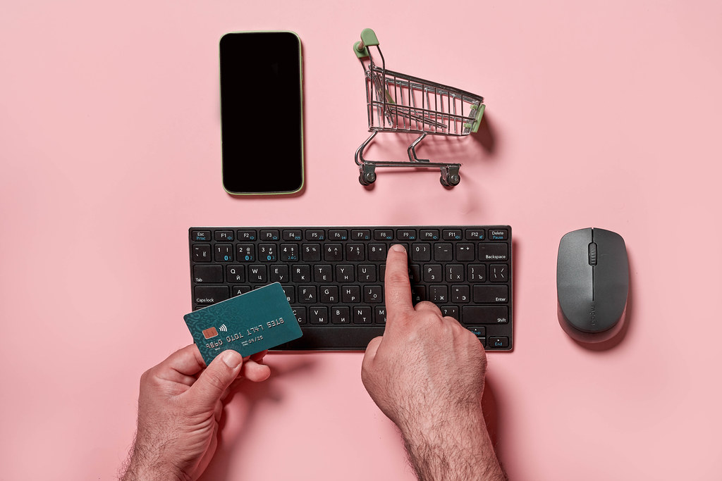 Online store - Shopping cart full with different items - computer ... Online store - Shopping cart full with different items - computer ...